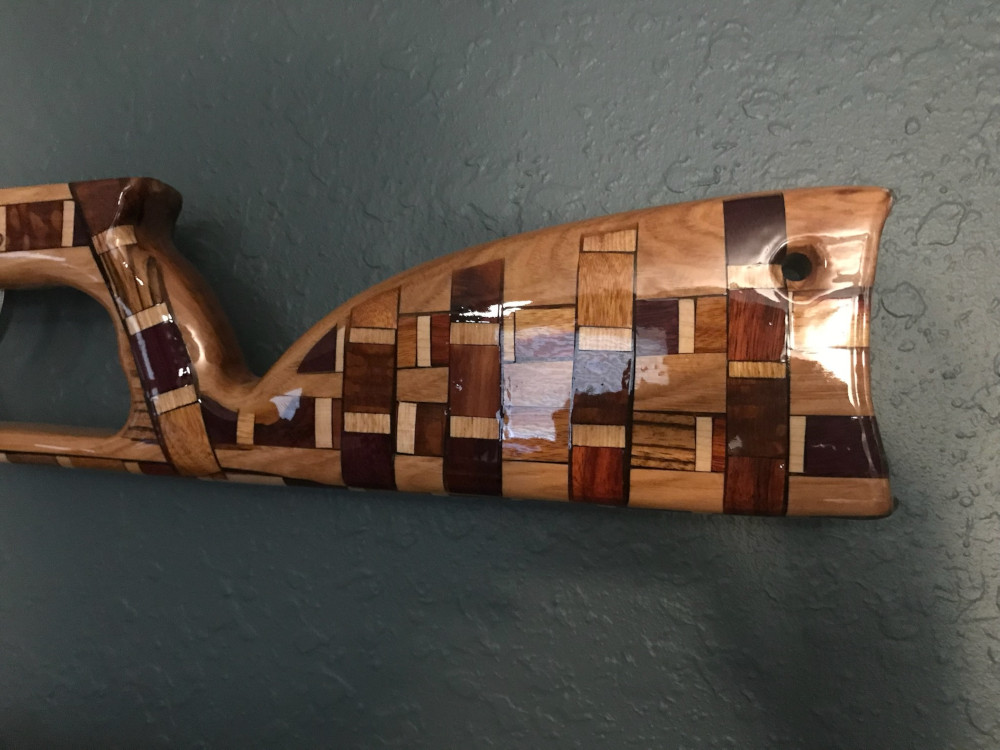TG-8 Red Oak with exotic wood inlay on both sides of the gun