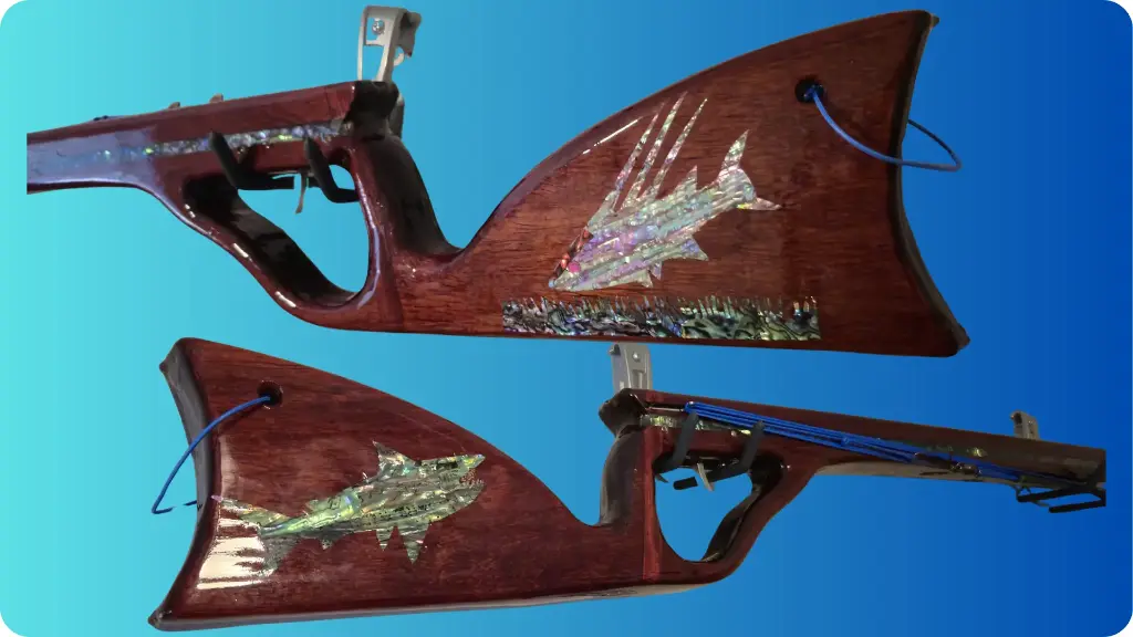 TG-5 Exotic Wood Padauk, Abalone inlay down both sides of the stock, one side with a hogfish in a grass bed and on the other side abalone shark inlay